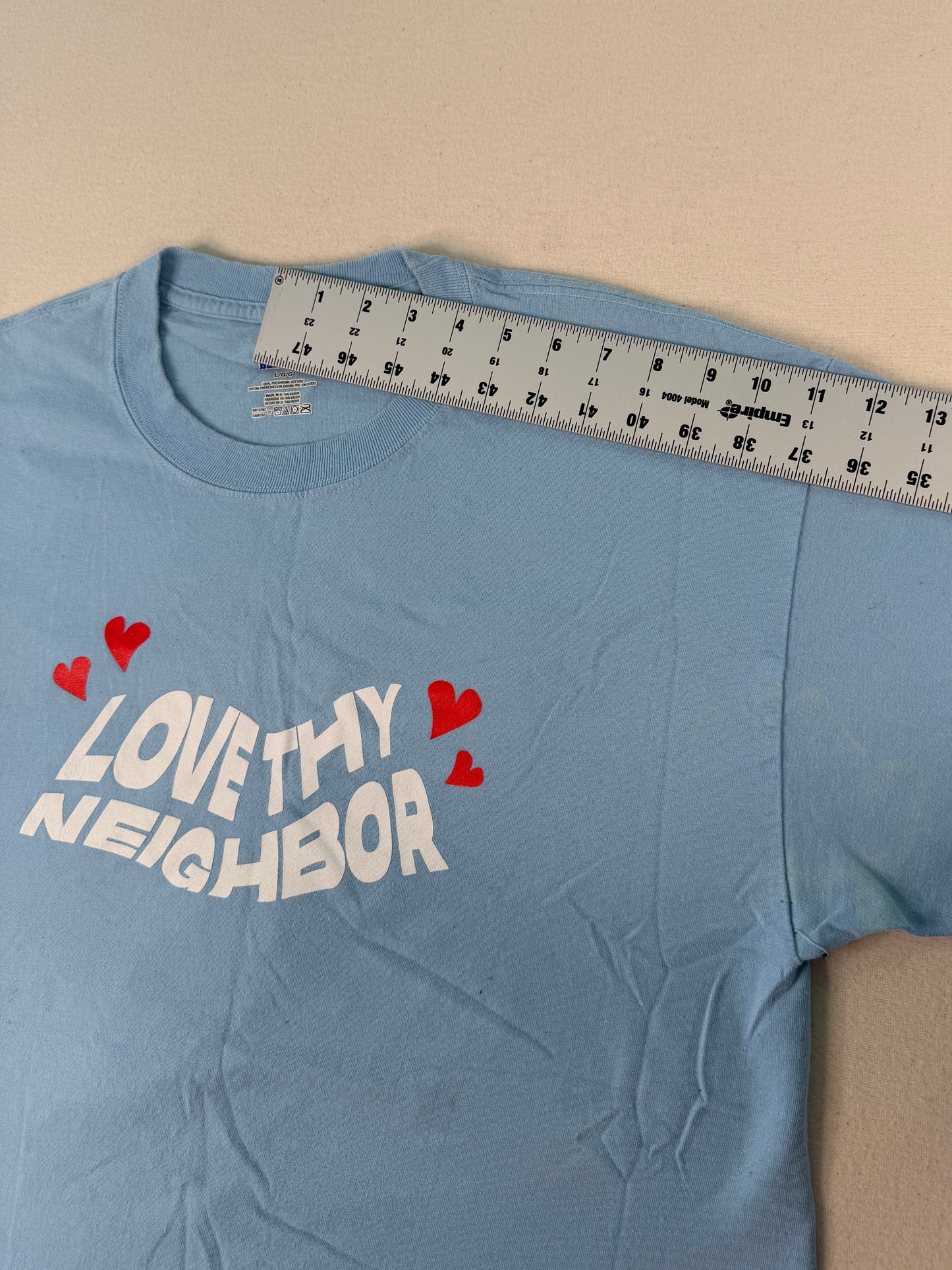 Love Thy Neighbor Graphic Tee – Baby Blue Vintage Style