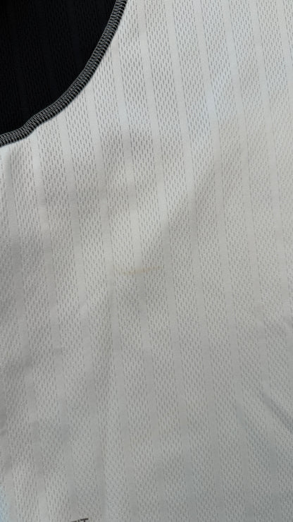Close-up of a textured gray fabric with a black border