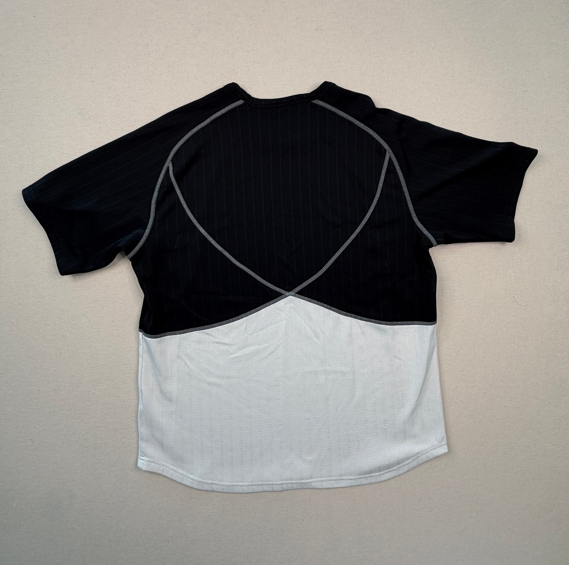 Black and white crop top on a beige background