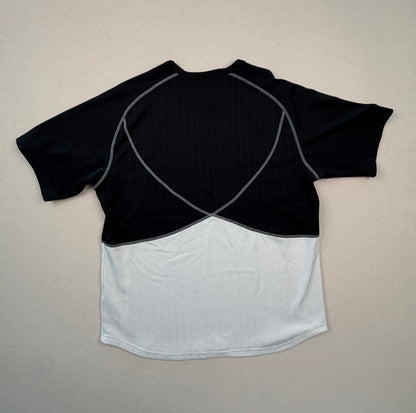 Black and white crop top on a beige background