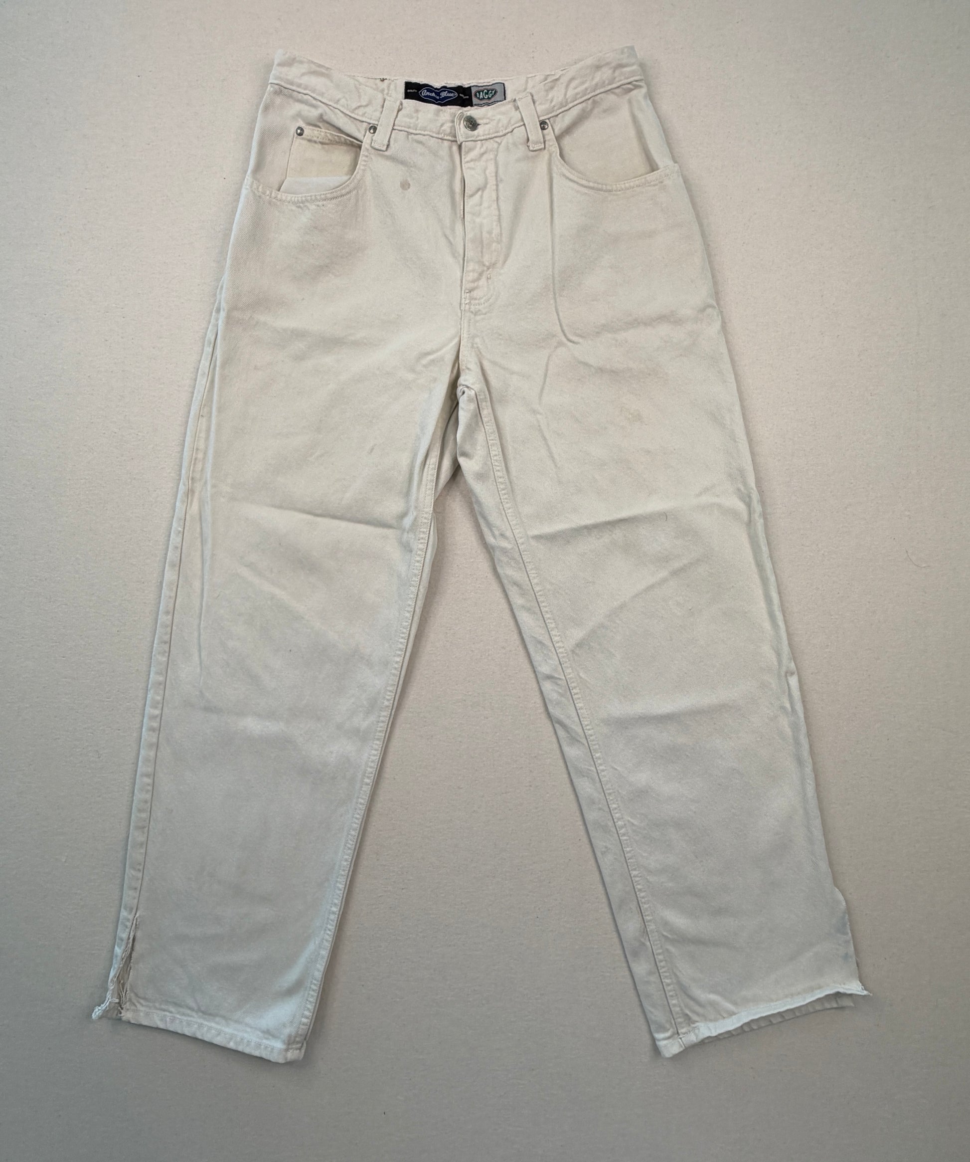 Beige jeans on a gray background