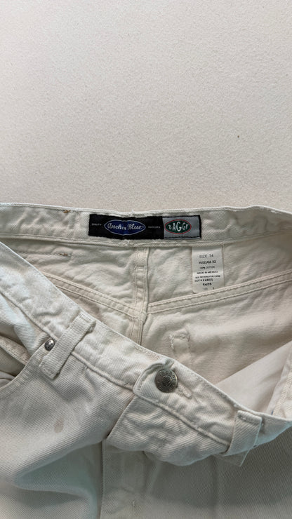 Light-colored denim jacket with a brand label on a white background