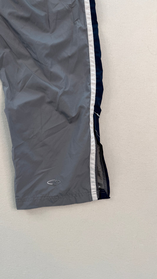 Gray shorts with a white stripe on a light gray background