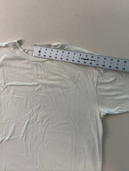 White shirt with a ruler on a light gray background