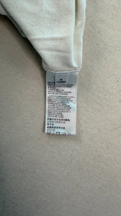 Textile label on a beige fabric background