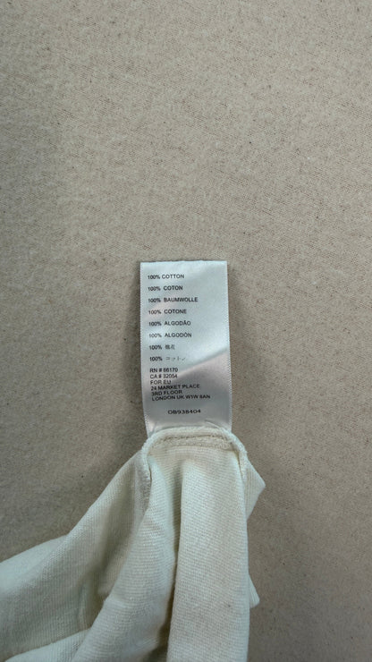 Clothing tag on a white fabric background