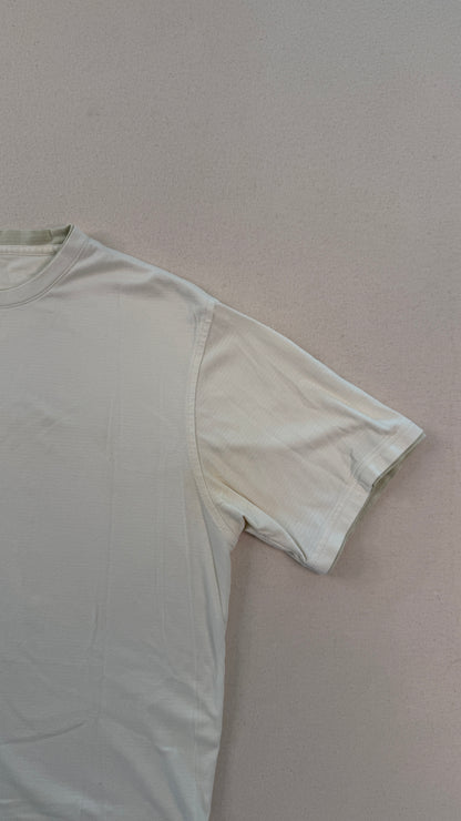 White t-shirt on a light pink background