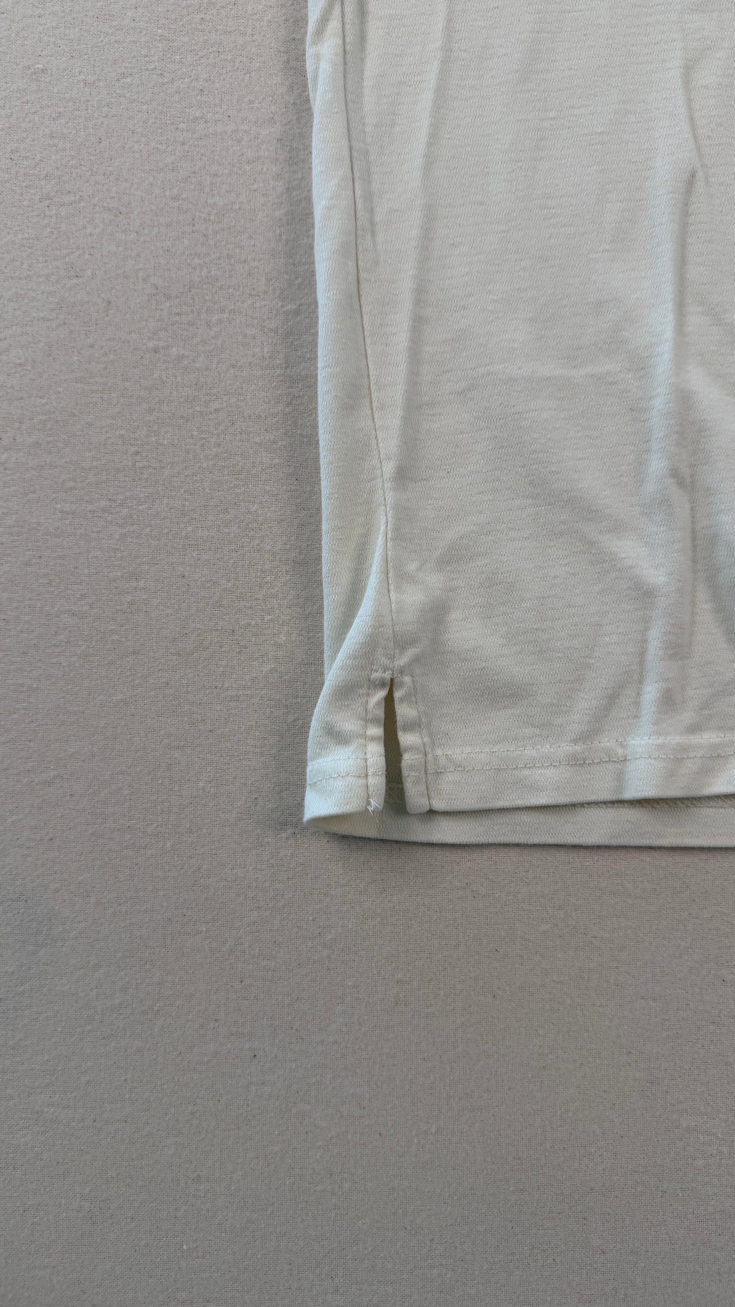 Light-colored shorts on a gray background