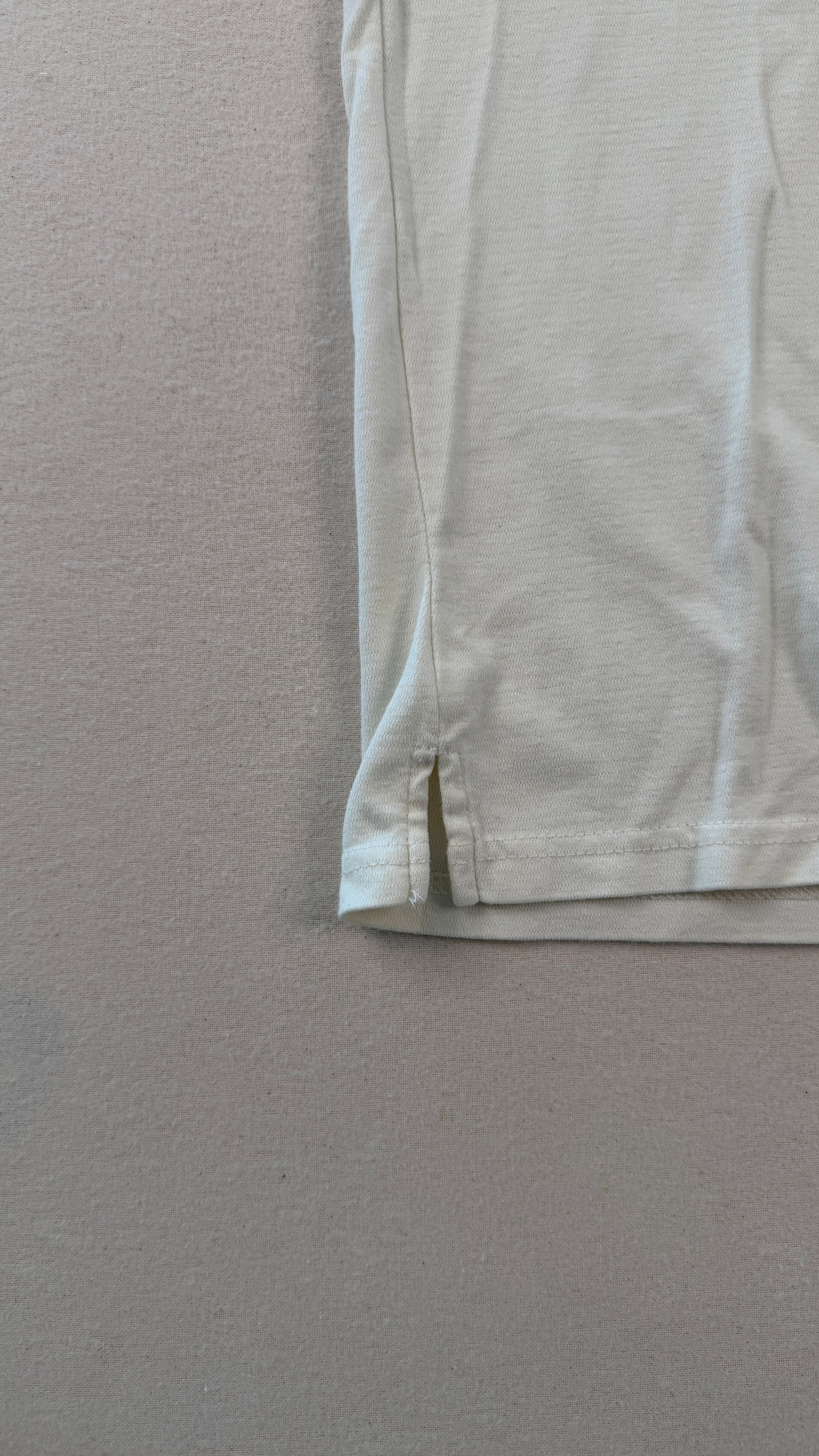 Light-colored shorts on a gray background