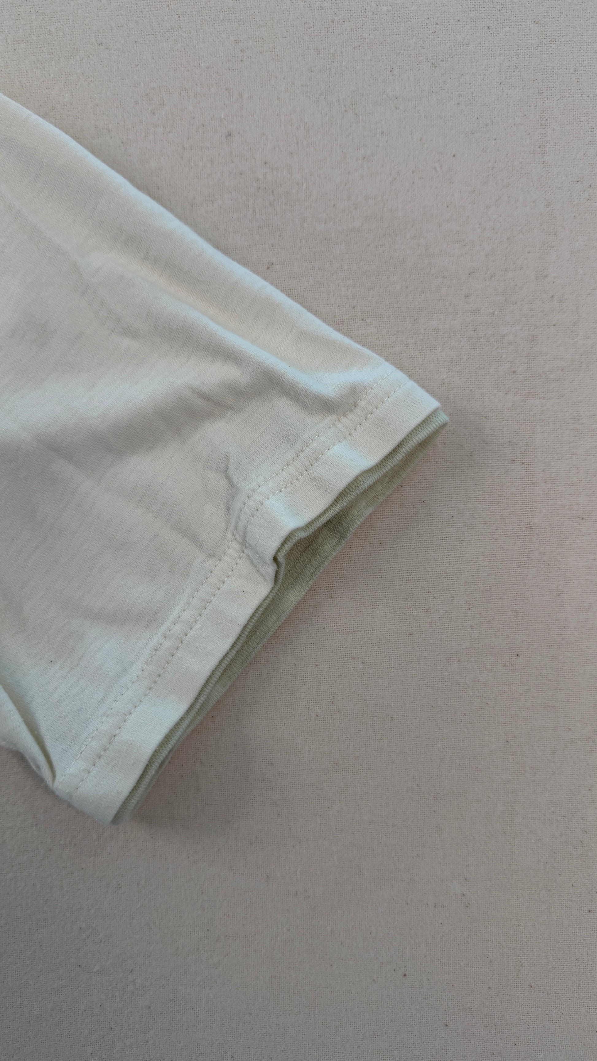 Light-colored fabric on a beige background