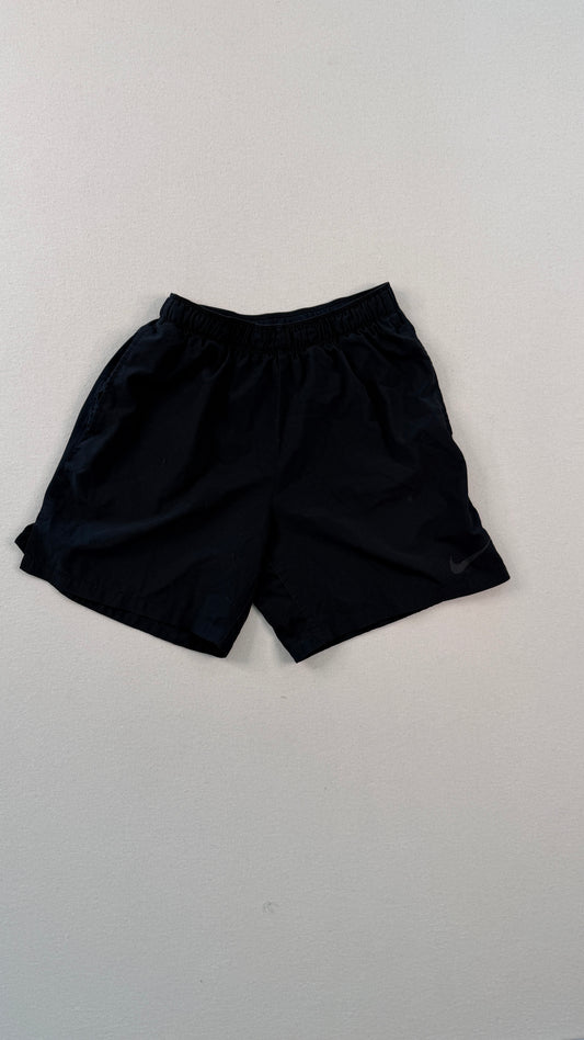 Black shorts on a light gray background