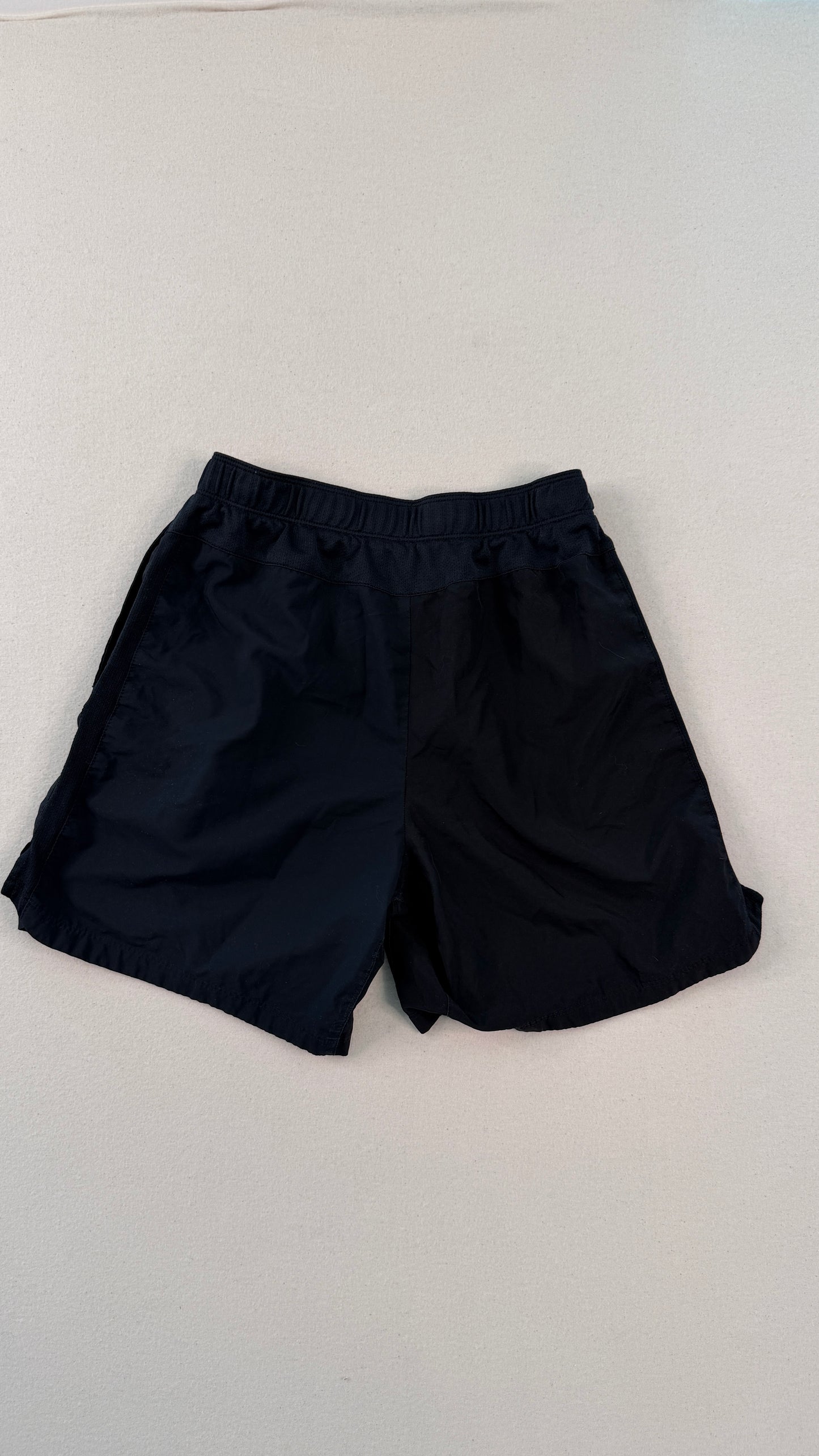 Black shorts on a light gray background