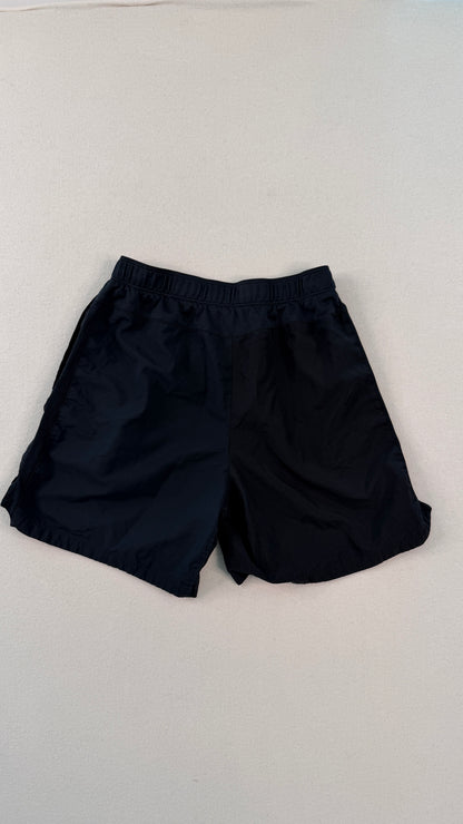 Black shorts on a light gray background
