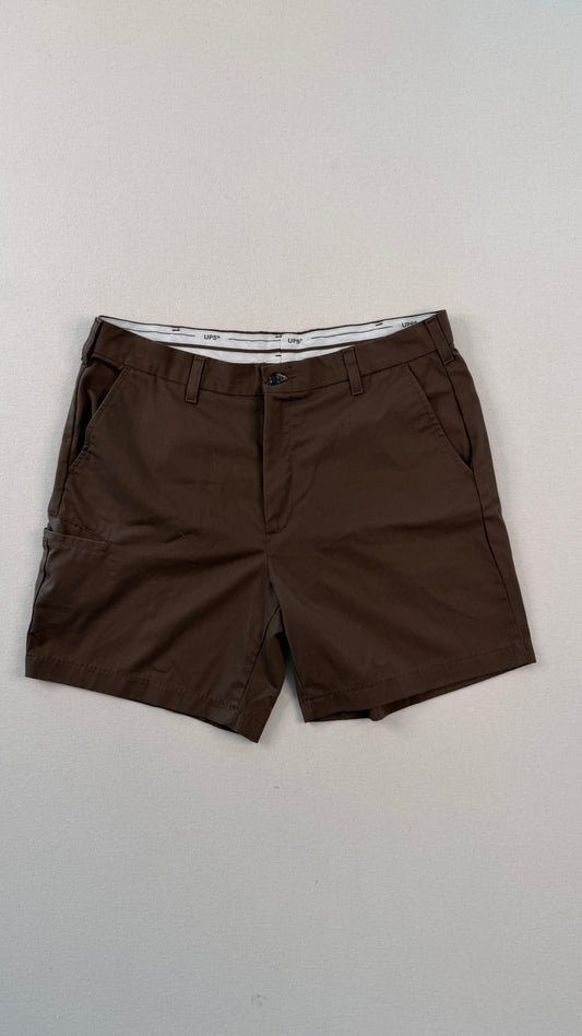 Brown shorts on a light gray background
