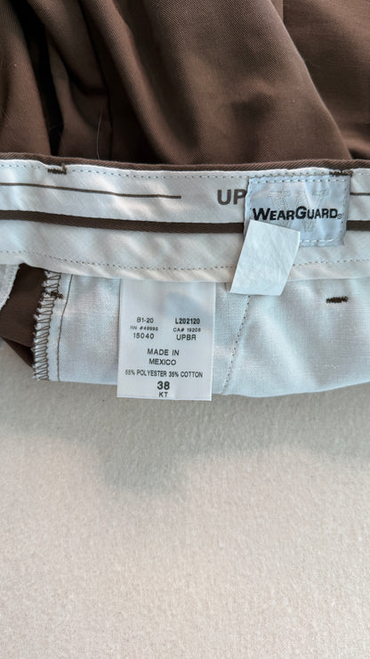 Close-up of a label on a brown garment with 'WearGuard' branding.
