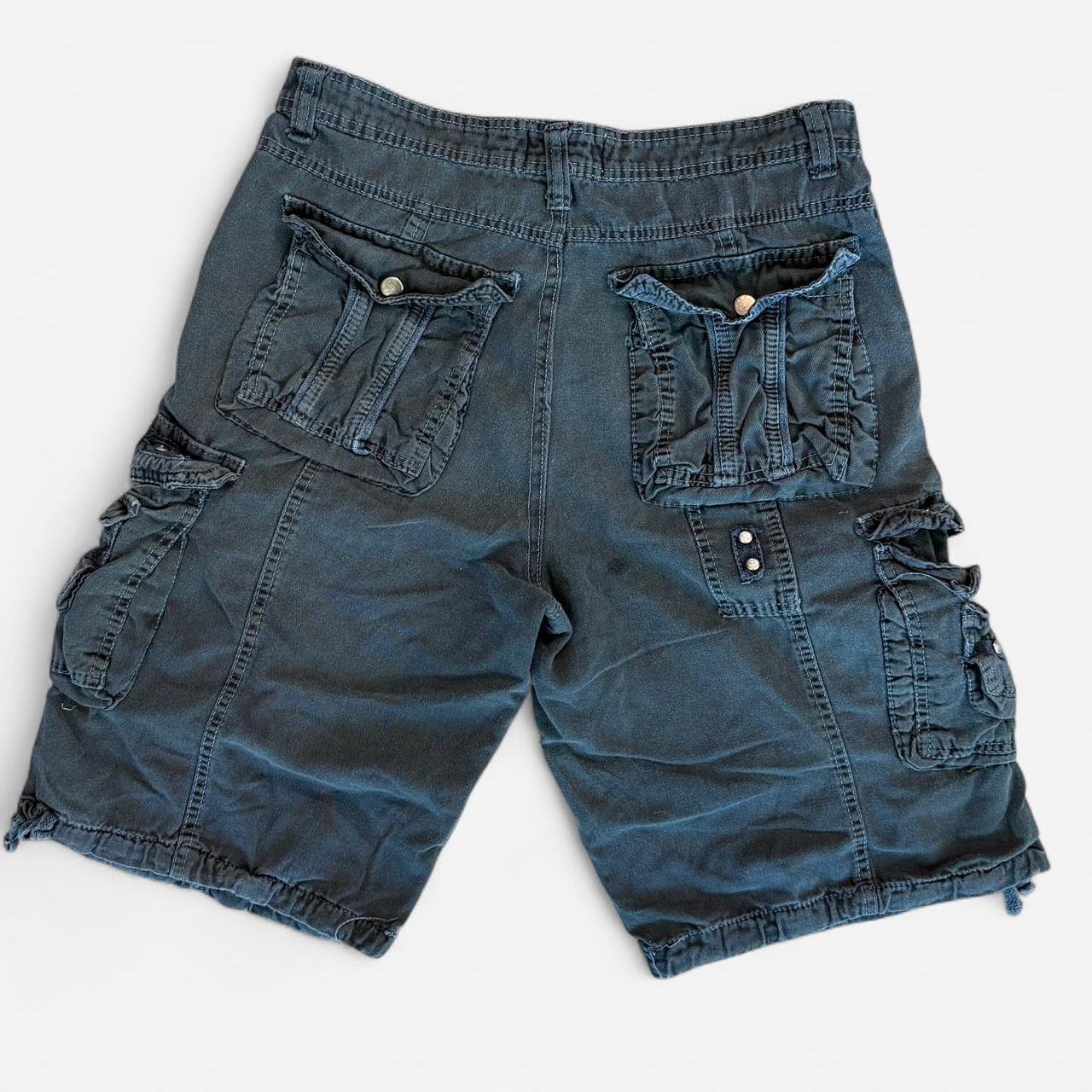 شورت سباحة رجالي من Riot Swim باللونين الأسود والرمادي